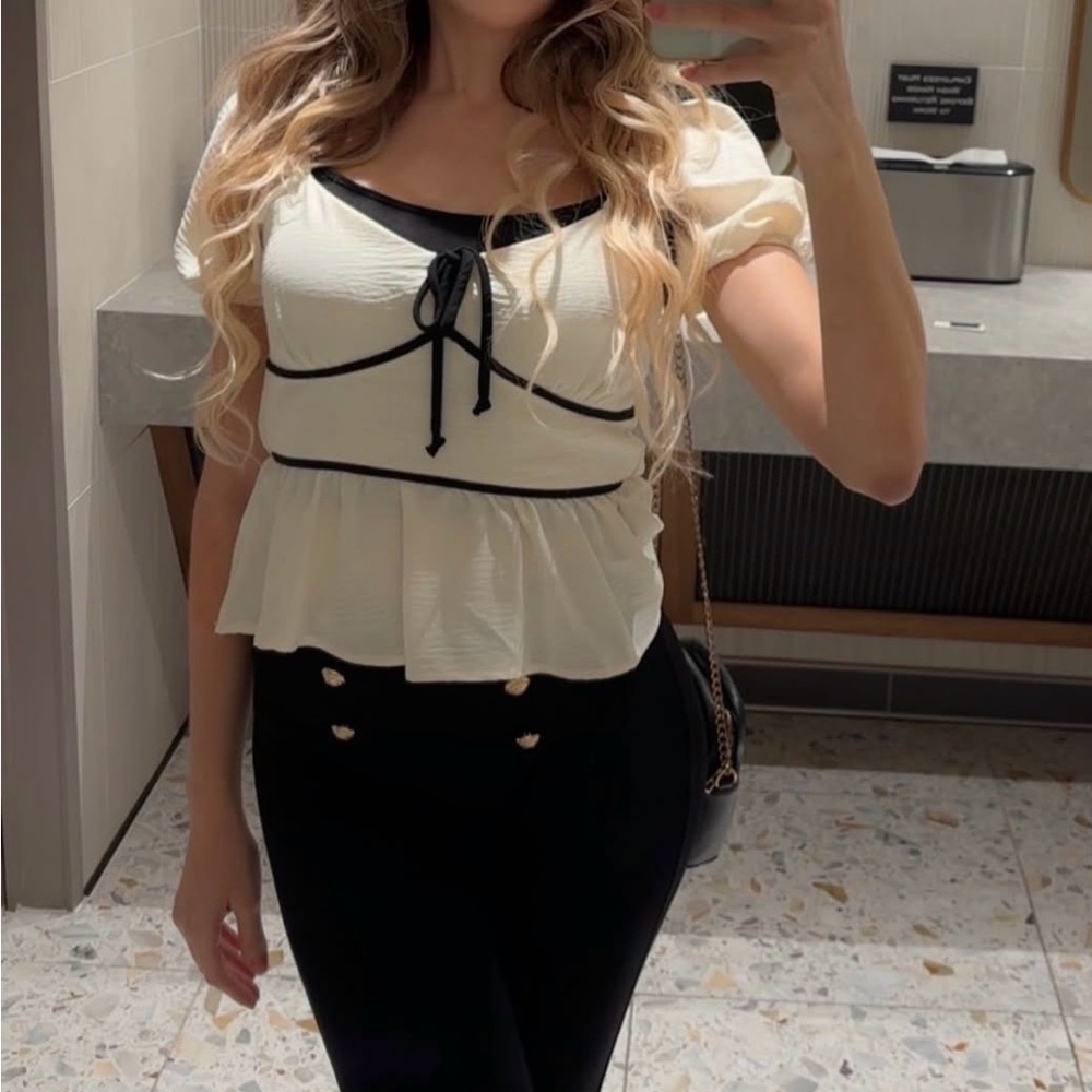 Cream Puff-Sleeve Peplum Top with Black Trim